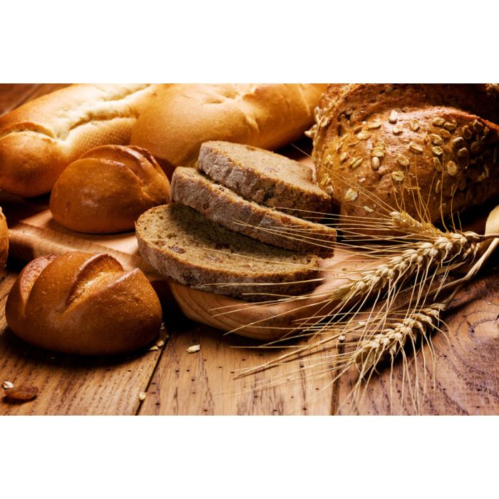 Assortment Of Baked Bread On Wood Table - ID # 15817711