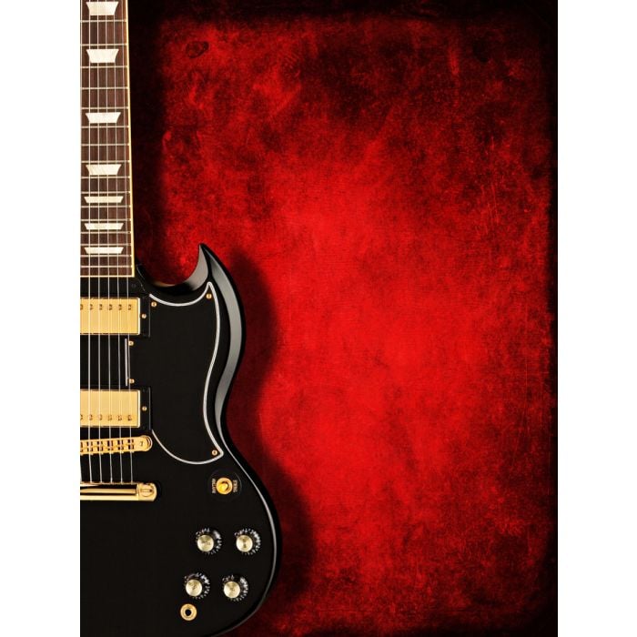 Electric Black Guitar On Dark Red Background - ID # 17875822