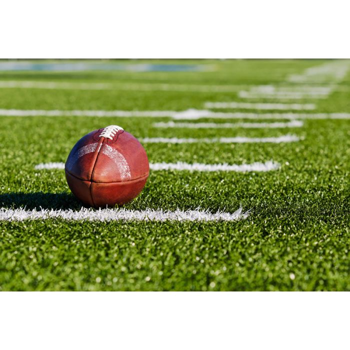 Football On Yardage Marker - Low Angle - ID # 4611118