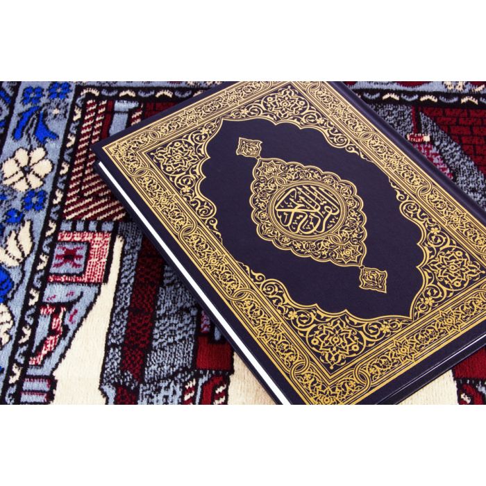 Qur'An Over Muslim Prayer Carpet - ID # 50128785