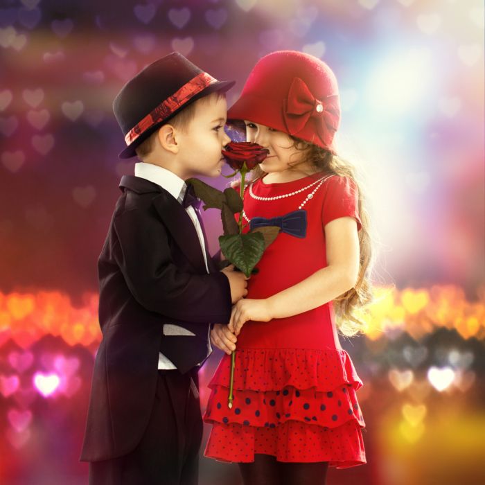 Lovely Little Boy Giving A Rose To Girl - ID # 60471791