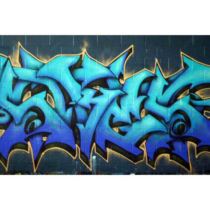 Colorful Graffiti Spray Painted On A Brick Wall - ID # 7970211