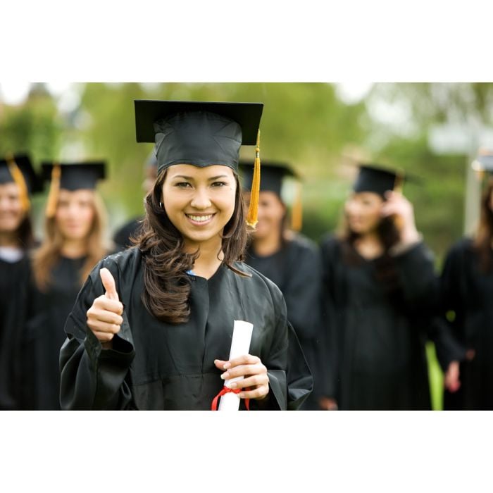 Graduation Girl Holding Her Diploma With Pride - ID # 9644063