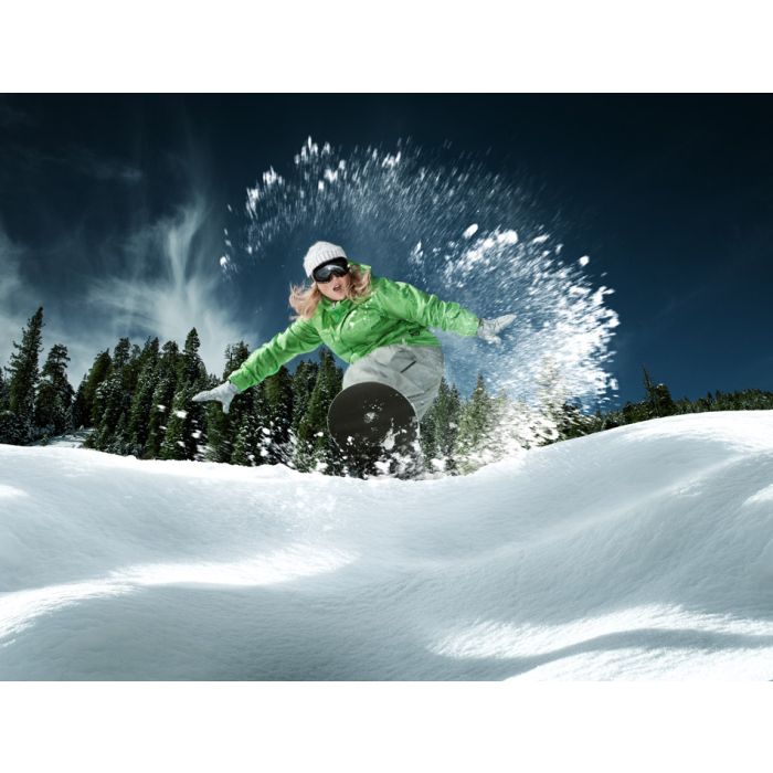 view of a young girl snowboarding in winter environment - ID # 230787361