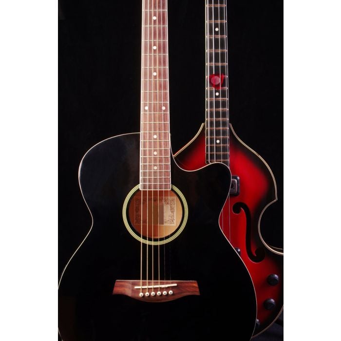 Acoustic and bass guitars on black - ID # 243079027