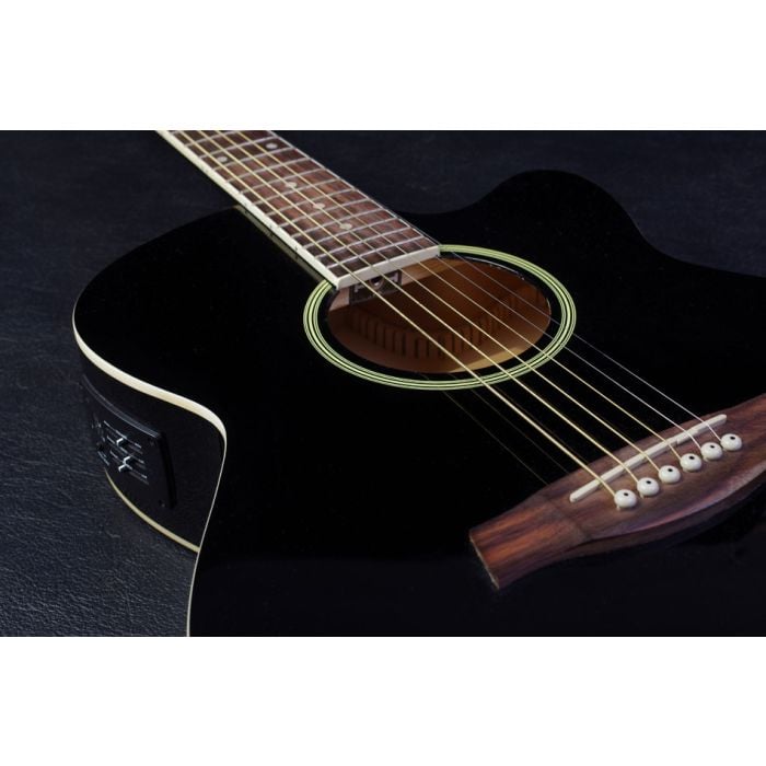 Acoustic guitar on black  - ID # 243079030