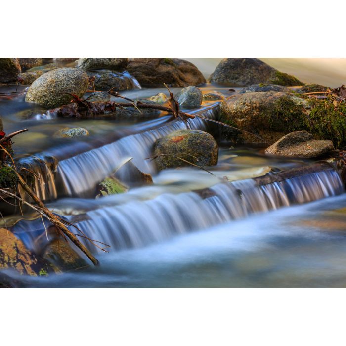 Nice small waterfall cascade on mountain river - ID # 246079714