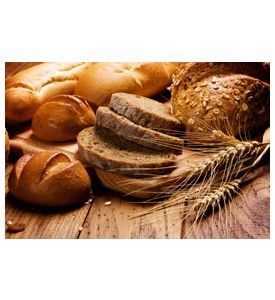 Assortment Of Baked Bread On Wood Table - ID # 15817711